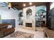 Living room fireplace with built-in shelving at 13634 7Th Avenue Ne Cir, Bradenton, FL 34212