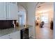 Kitchen with granite countertops and white cabinets at 13634 7Th Avenue Ne Cir, Bradenton, FL 34212