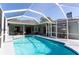 Inviting screened-in pool area with ample space for lounging and entertaining at 13634 7Th Avenue Ne Cir, Bradenton, FL 34212