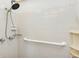 Simple bathroom with shower and grab bar at 4009 38Th Avenue W Dr # 4009, Bradenton, FL 34205