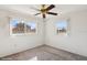 Bedroom with carpeted floor and ceiling fan at 4009 38Th Avenue W Dr # 4009, Bradenton, FL 34205