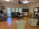 Community room with seating, TV, and hardwood floors at 4009 38Th Avenue W Dr # 4009, Bradenton, FL 34205