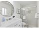 Clean bathroom with a walk-in shower and modern vanity at 151 Adair Ave, Sarasota, FL 34243