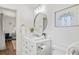 Bright bathroom with updated fixtures and a large vanity at 151 Adair Ave, Sarasota, FL 34243