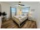 Well-lit bedroom with a queen bed and coastal decor at 151 Adair Ave, Sarasota, FL 34243