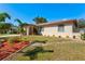 Well maintained home with attractive landscaping and walkway at 151 Adair Ave, Sarasota, FL 34243