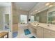 Bathroom features a double vanity, soaking tub, and a separate shower at 3522 Little Country Rd, Parrish, FL 34219