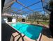 Inviting screened pool with a large deck at 4409 Eleuthera Ct, Sarasota, FL 34233