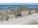 Aerial view of beachfront property with white sand and ocean views at 4440 Exeter Dr # N304, Longboat Key, FL 34228