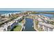 Aerial view of waterfront community with pool and boat slips at 4440 Exeter Dr # N304, Longboat Key, FL 34228