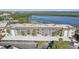 Aerial view of the building and parking at 4440 Exeter Dr # N304, Longboat Key, FL 34228