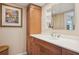 Bathroom with vanity and linen storage at 4440 Exeter Dr # N304, Longboat Key, FL 34228