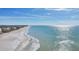 Expansive beach view with clear water and sunny skies at 4440 Exeter Dr # N304, Longboat Key, FL 34228