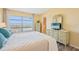 Bedroom with water views and large window at 4440 Exeter Dr # N304, Longboat Key, FL 34228