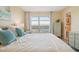 Main bedroom with water views and large window at 4440 Exeter Dr # N304, Longboat Key, FL 34228