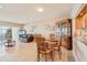 Charming dining area with wooden table and kitchen views at 4440 Exeter Dr # N304, Longboat Key, FL 34228