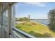 Stunning view of waterfront property with lush landscaping and marina at 4440 Exeter Dr # N304, Longboat Key, FL 34228