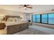 Spacious bedroom with water views and a king-size bed at 4557 Bay Club Dr, Bradenton, FL 34210