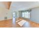 Bright living room with wood floors and a bay window at 5604 Garden Lakes Dr, Bradenton, FL 34203