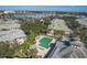 Aerial view of community pool and lakefront homes at 6503 Moorings Point Cir # 202, Lakewood Ranch, FL 34202