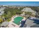 Aerial view of community pool and surrounding buildings at 6503 Moorings Point Cir # 202, Lakewood Ranch, FL 34202