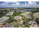 Aerial view of community pool and buildings at 6503 Moorings Point Cir # 202, Lakewood Ranch, FL 34202