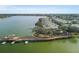 Long wooden walkway stretching along the lake at 6503 Moorings Point Cir # 202, Lakewood Ranch, FL 34202