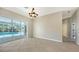 Dining area with pool view and access to patio at 8186 Shadow Pine Way, Sarasota, FL 34238