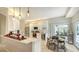 Modern kitchen with white cabinets and granite counters at 8186 Shadow Pine Way, Sarasota, FL 34238