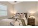 Cozy bedroom with wood furniture and neutral decor at 16026 39Th E Gln, Parrish, FL 34219