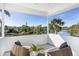 Private balcony with wicker seating and waterfront views at 1718 Bay St, Sarasota, FL 34236