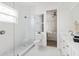 Elegant bathroom with a walk-in shower and toilet at 1718 Bay St, Sarasota, FL 34236