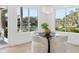 Charming breakfast nook with a round table and chairs, offering water views at 1718 Bay St, Sarasota, FL 34236