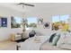 Main bedroom with water views, plush bedding, and ample closet space at 1718 Bay St, Sarasota, FL 34236