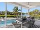 Covered patio with water views, dining area, and comfortable seating at 1718 Bay St, Sarasota, FL 34236