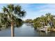 Scenic waterfront view with lush tropical foliage and a peaceful canal at 1718 Bay St, Sarasota, FL 34236