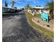 Caribbean Villas community entrance with palm trees and landscaped grounds at 1741 Caribbean Cir # 13, Venice, FL 34293