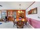 Classic dining room with a wood table and chairs, offering a space for Gathering meals at 2669 Prospect St, Sarasota, FL 34239