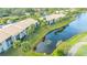 Aerial view of condo building near water at 4410 Weybridge # 91, Sarasota, FL 34235