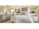 Bedroom with ensuite access and ample closet space at 4410 Weybridge # 91, Sarasota, FL 34235