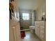 Clean bathroom with a toilet, shower, and vanity at 4951 Bell Meade Dr, Sarasota, FL 34232