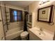 Clean bathroom with a shower/tub combo and updated vanity at 4951 Bell Meade Dr, Sarasota, FL 34232