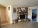 Stone fireplace in the living room with a wood mantel at 4951 Bell Meade Dr, Sarasota, FL 34232