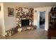 Stone fireplace with a wood mantel in the living room at 4951 Bell Meade Dr, Sarasota, FL 34232