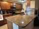 Modern kitchen with granite countertops and stainless steel appliances at 4951 Bell Meade Dr, Sarasota, FL 34232