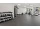 Spacious gym offering a variety of exercise equipment including weights, machines, and cardio options at 1035 Seaside Dr # 305, Sarasota, FL 34242