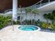 Cozy outdoor spa area surrounded by lush greenery, offering a serene retreat at 1035 Seaside Dr # 305, Sarasota, FL 34242