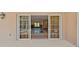 View through sliding glass doors shows the home's interior under renovation at 322 Avenida De Paradisio, Sarasota, FL 34242