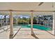 Covered patio with pool access, ideal for relaxation at 322 Avenida De Paradisio, Sarasota, FL 34242