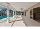 Spacious covered patio overlooking a refreshing swimming pool at 322 Avenida De Paradisio, Sarasota, FL 34242